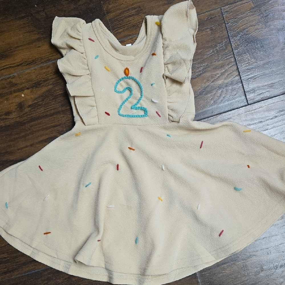 Adorable Tan Dress with Number Two Design